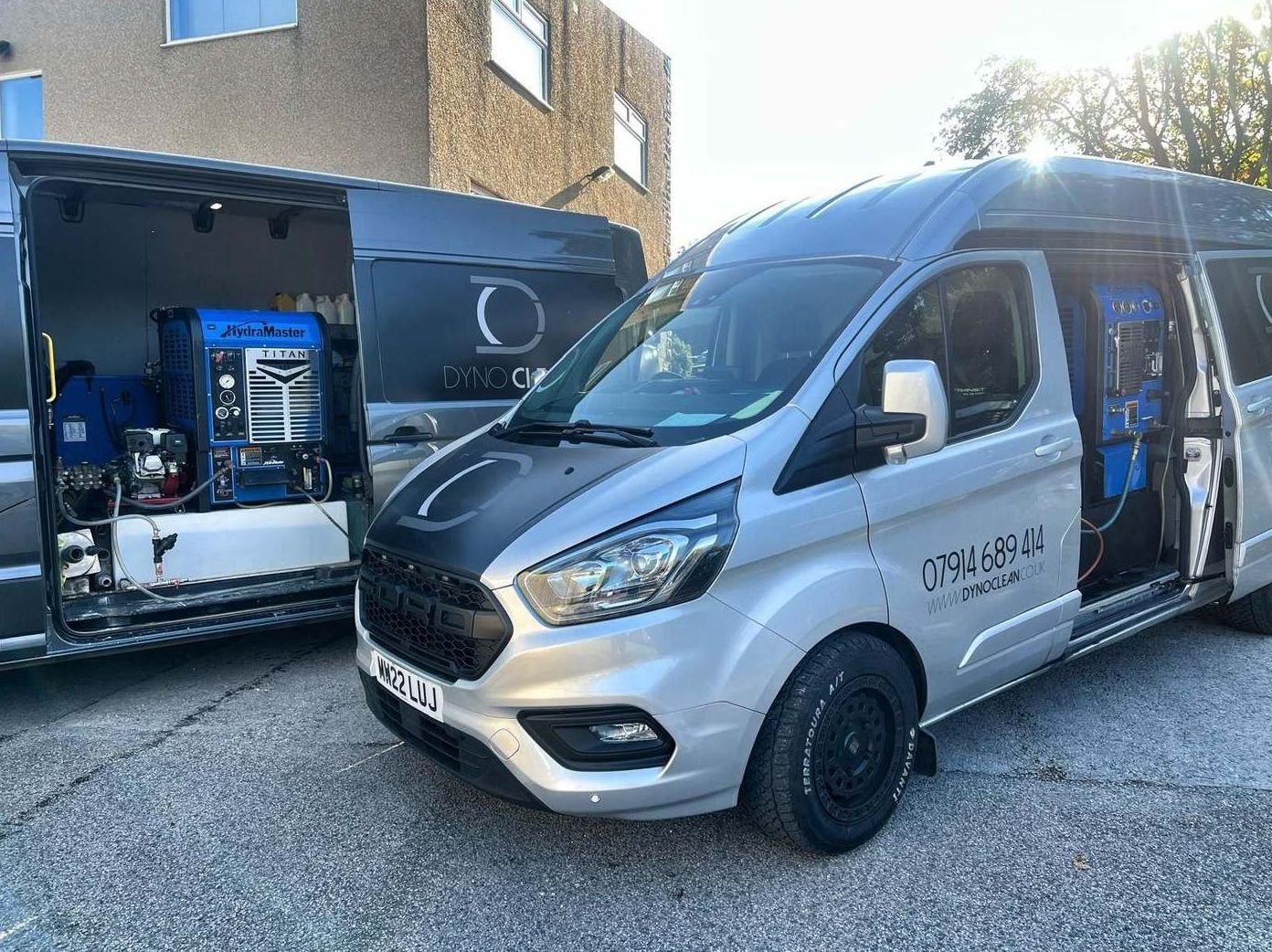 DynoClean van with truck-mounted cleaning equipment on site