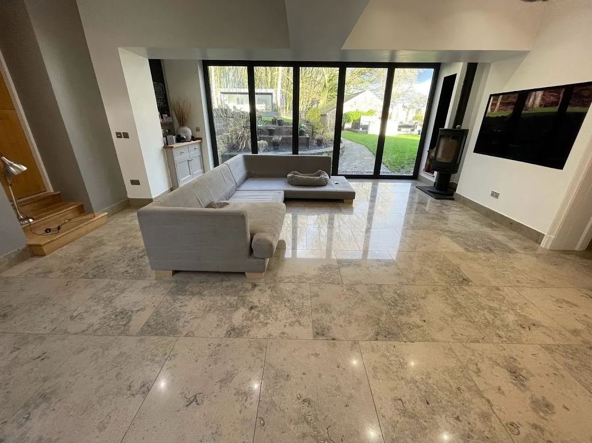 Polished limestone floor restored by DynoClean